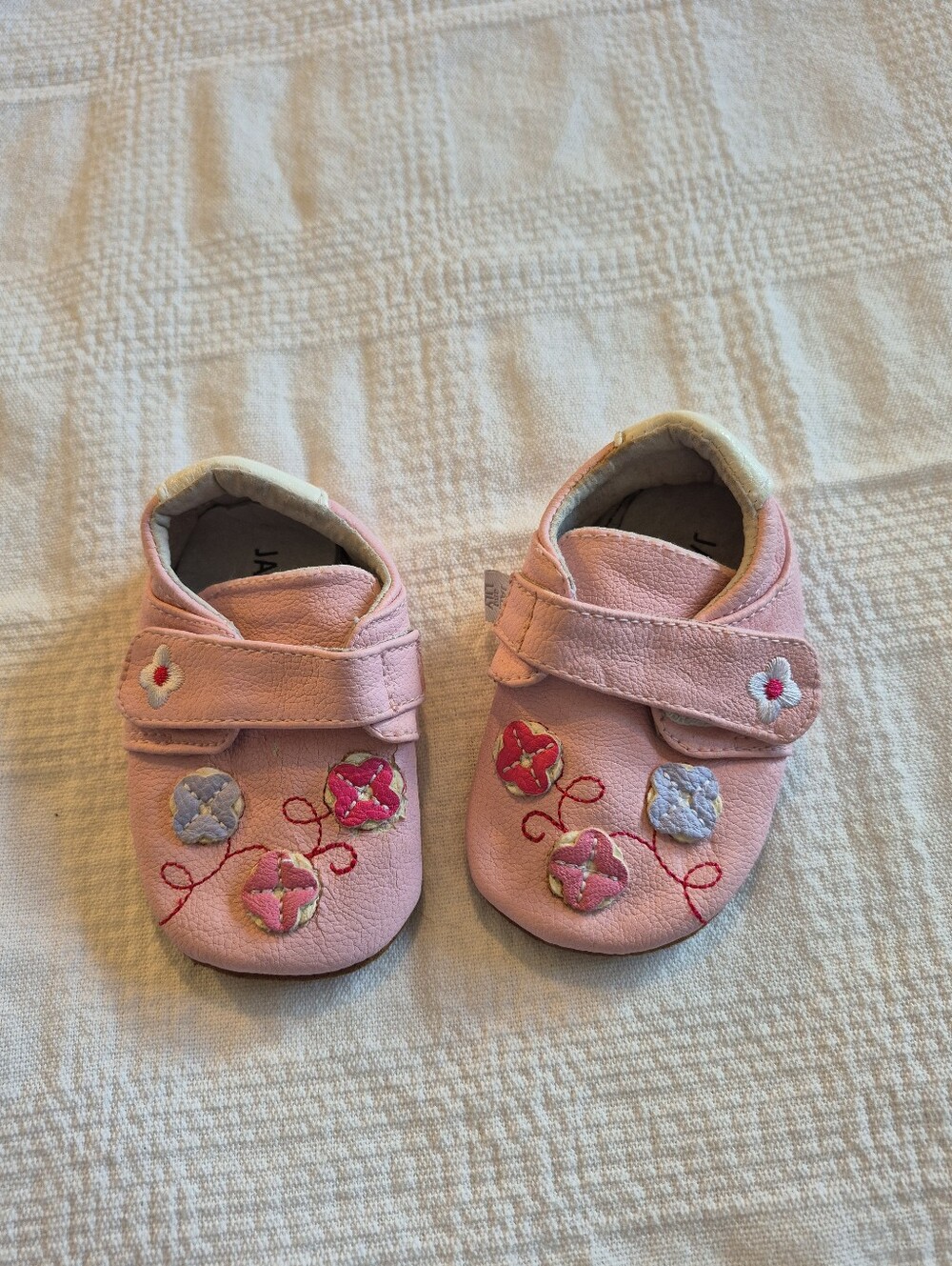 Jack & Lily girls size 6-12 pink leather mocs  GUC RT shoe has defect